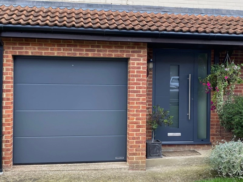 Hormann sectional and RK front entrance door grey