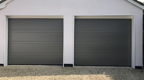 Two New Hormann Sectional Garage Doors